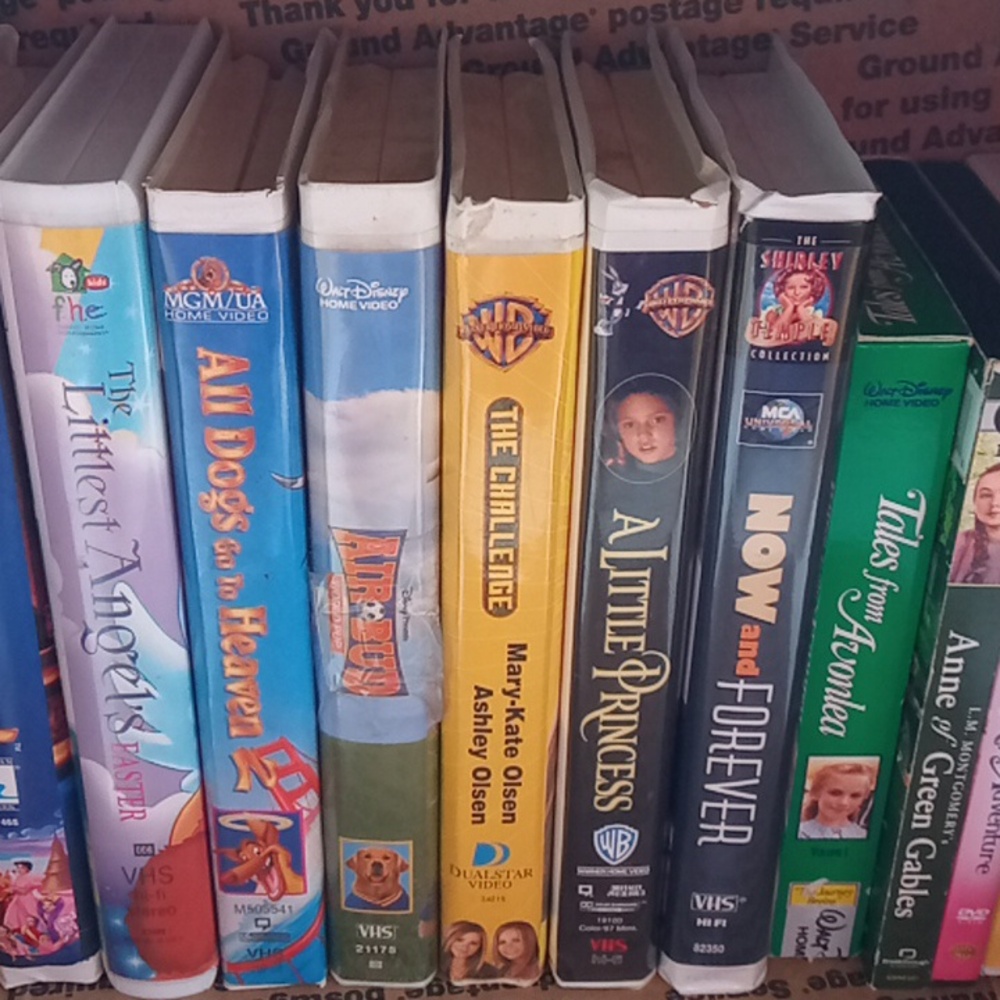 VHS Tapes And DVDs Bundle
